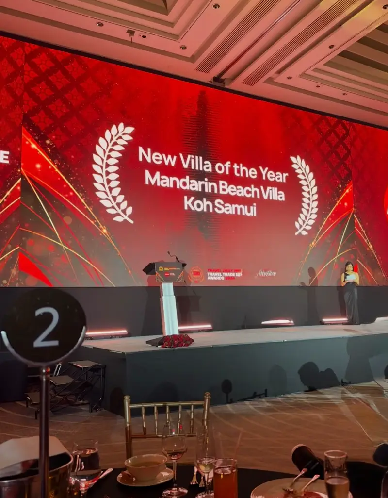 The awards stage screen reading New Villa of the Year, Mandarin Beach Villa Koh Samui.