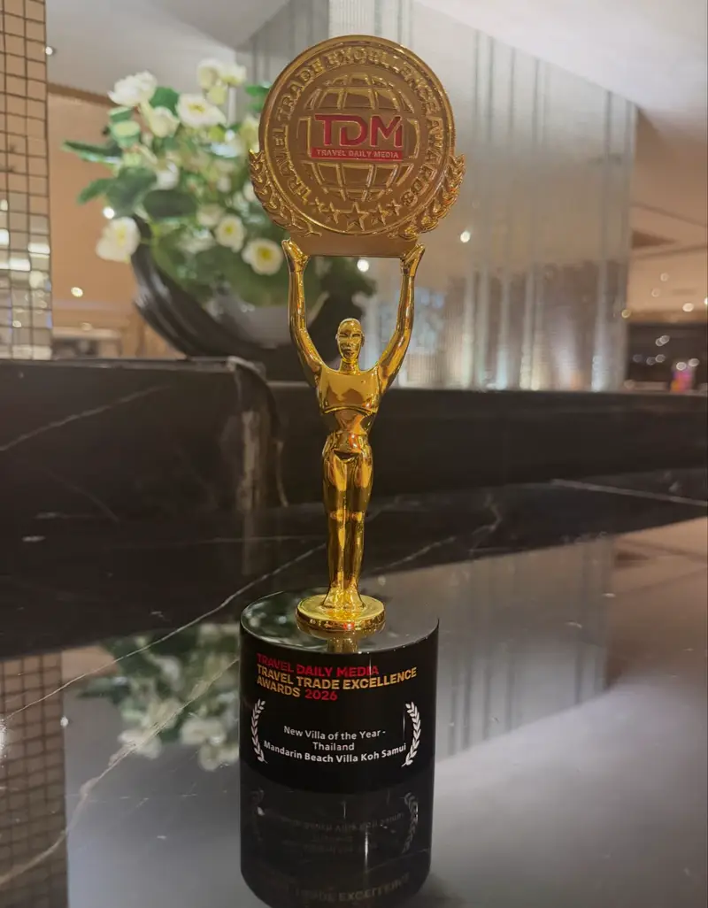 The gold TDM award statuette for New Villa of the Year, Thailand, Mandarin Beach Villa Koh Samui.