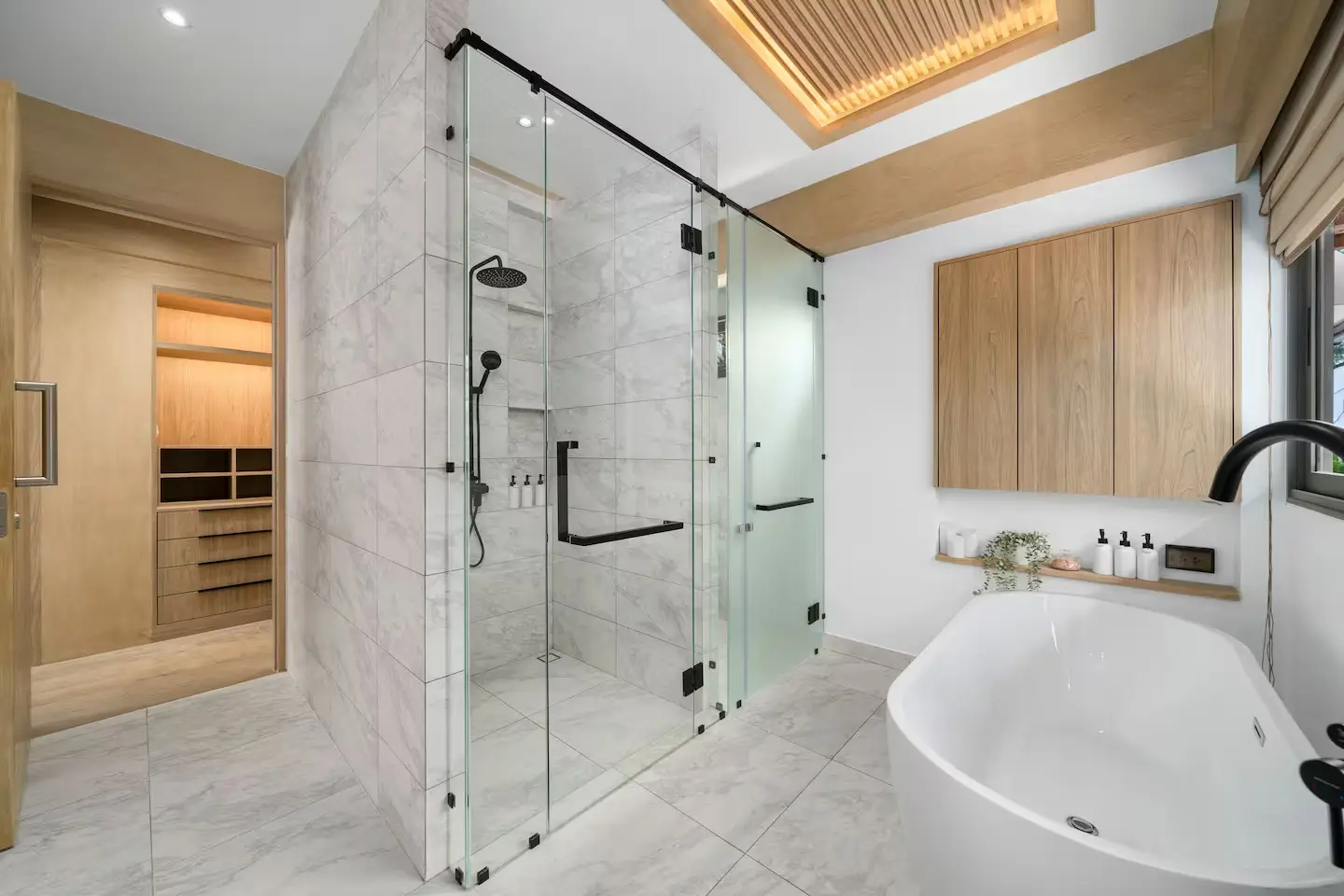 Luxury family ensuite bathroom with bath, twin sinks and spacious layout at Mandarin Beach Villa Koh Samui.