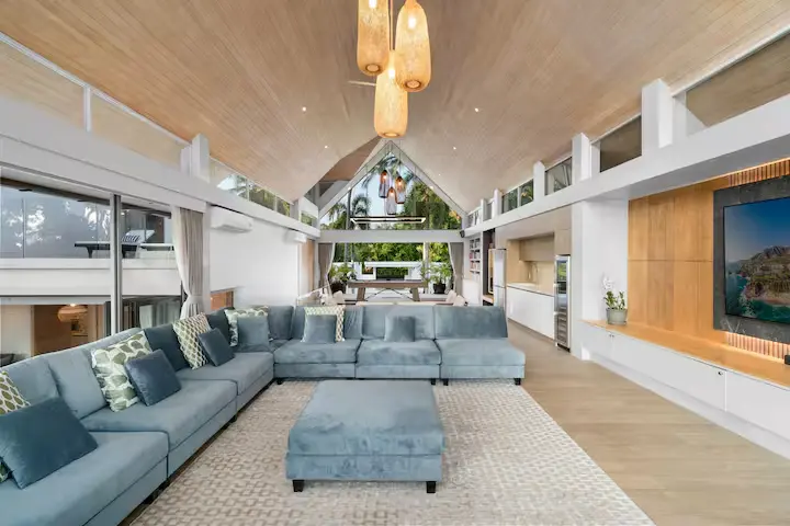 Luxury upstairs family lounge with library and private bar at Mandarin Beach Villa Koh Samui.