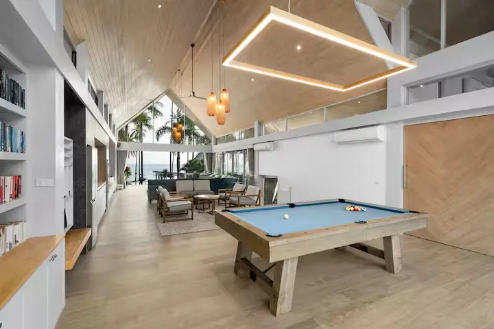 Luxury family entertainment lounge with custom pool table at Mandarin Beach Villa Koh Samui.