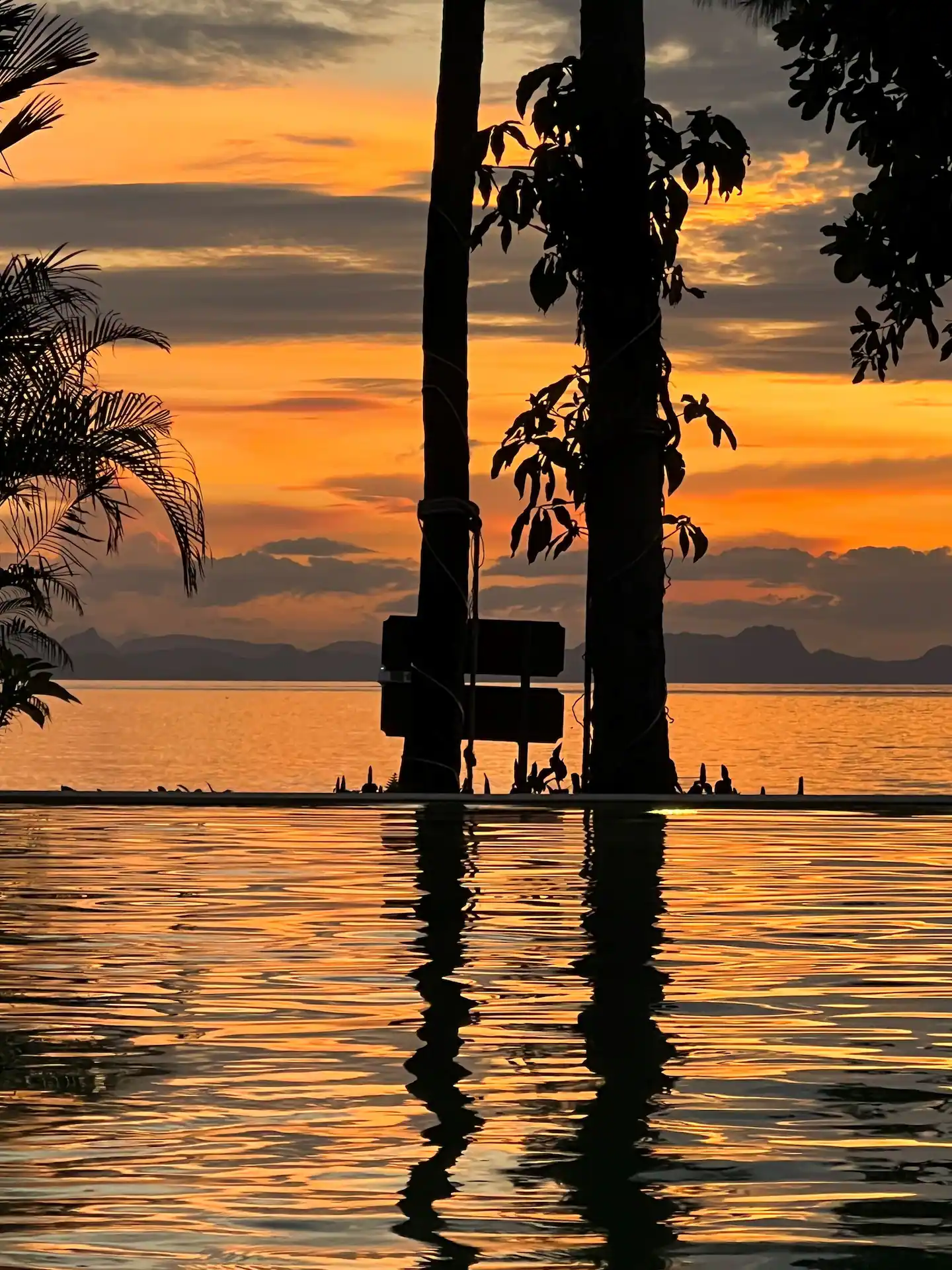 Spectacular sunset view from the beachfront pool at Mandarin Beach Villa Koh Samui.