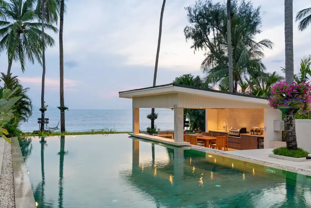 Tropical beachfront pool overlooking the sea at Mandarin Beach Villa Koh Samui.